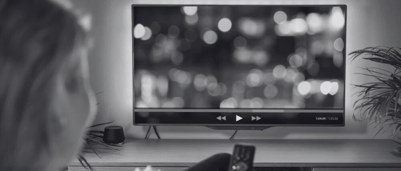 Woman watching TV ()