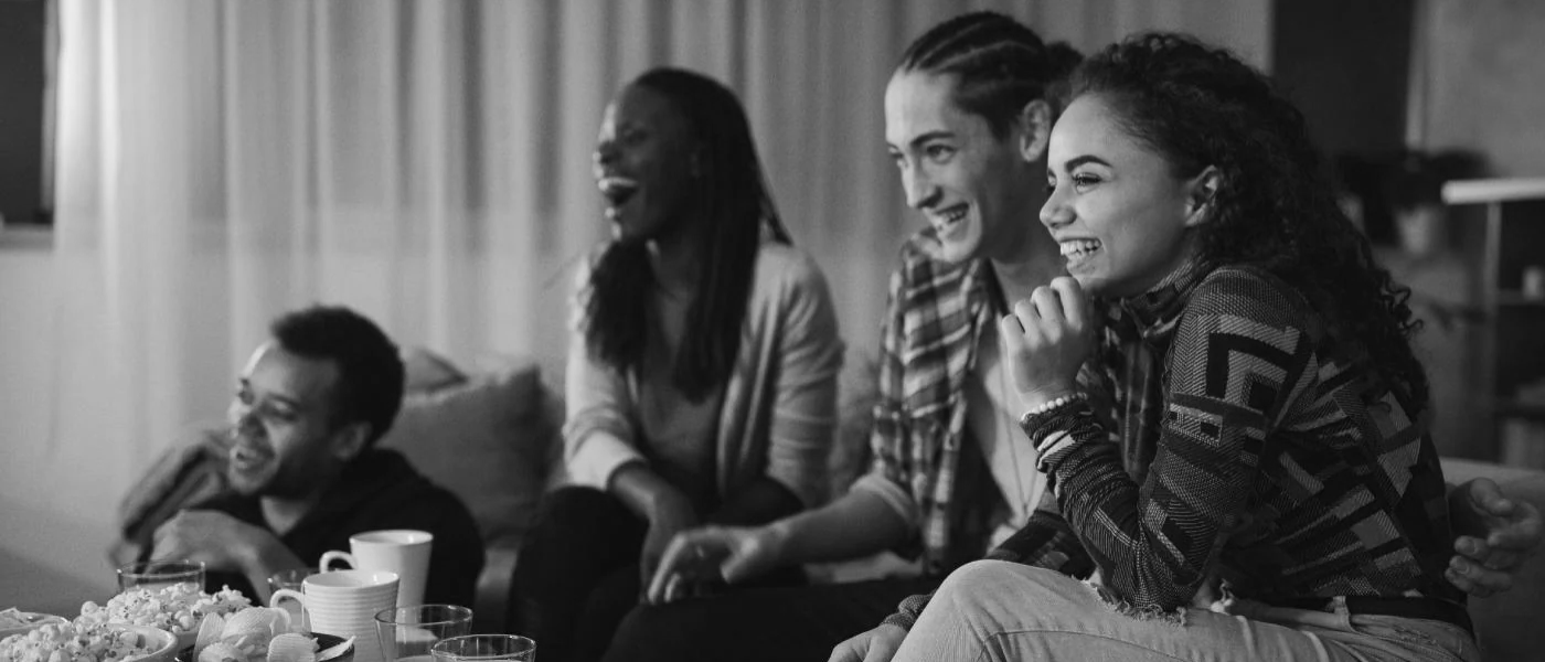 People watching a movie at home ()